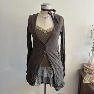 Brown cardigan with shell buttons and bubble hem
